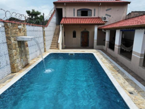 Casa no Litoral Norte com piscina - até 10 pessoas